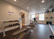 Thumbnail 22 of 27 - Gym with weight training equipments at Willett Apartments, Albany, 12210