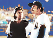 Thumbnail 7 of 9 - two baseball players standing next to each other on a field