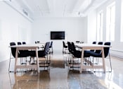 Thumbnail 5 of 5 - a conference room with tables and chairs