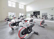 Thumbnail 2 of 5 - a gym full of exercise bikes in a large room