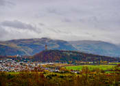 Thumbnail 4 of 5 - a city from the hill above a city