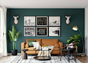 Thumbnail 6 of 6 - a living room with a green wall and a brown couch