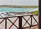 Thumbnail 6 of 6 - a view of the beach from the porch
