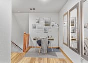 Thumbnail 4 of 12 - A dining room with a table and chairs.