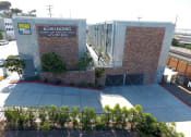 Thumbnail 18 of 18 - Aerial view of property showing driveway to parking garage