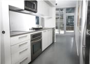 Thumbnail 7 of 18 - Kitchen of Alta Floorplan with stainless steel appliances