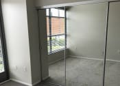 Thumbnail 15 of 18 - Master bedroom of Allure floorplan with mirrored glass closet