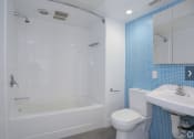 Thumbnail 8 of 18 - Second bathroom of Alta Floorplan with colored ceramic tiles