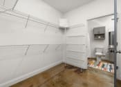 Thumbnail 8 of 18 - a bathroom with white walls and a white toilet next to a white sink