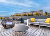 Thumbnail 17 of 24 - Dominion Rooftop With Seating and Coffee Table