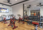 Thumbnail 17 of 29 - 24-Hour Fitness Center With Free Weights at Integra Sunrise Parc, Kissimmee, Florida