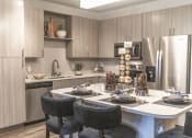 Thumbnail 1 of 29 - Fully Equipped Kitchen With Modern Appliances at Integra Sunrise Parc, Kissimmee, Florida