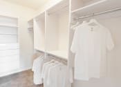 Thumbnail 32 of 34 - The Gate Apartments Model Unit Closet with built-in shelves
