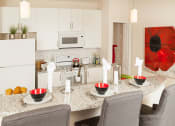 Thumbnail 2 of 34 - The Gate Apartments Model Unit Kitchen Bar