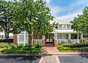 Thumbnail 1 of 28 - Clubhouse and leasing office exterior - Belle Harbour Apartments