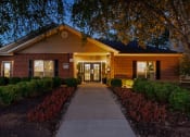 Thumbnail 1 of 18 - East Chase Apartments exterior photo of clubhouse entrace