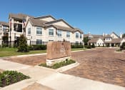 Thumbnail 1 of 23 - The Retreat at Cinco Ranch entrance sign
