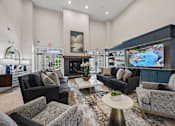 Thumbnail 2 of 29 - Resident clubhouse lounge with fireplace - Avenel at Montgomery Square