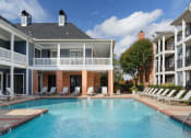 Thumbnail 2 of 24 - Island Park and Harbor Town Square Apartments - Resort-style swimming pool