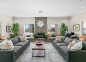 Thumbnail 2 of 25 - Mountain Shadows Apartments - Clubhouse social area with fireplace