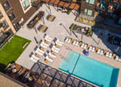 Thumbnail 2 of 22 - Large pool deck with ample lounge seating - Onyx Edina