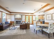 Thumbnail 2 of 17 - Resident clubhouse lounge area with fireplace - Springbrook Apartments