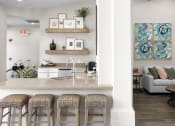 Thumbnail 3 of 26 - Ample seating in clubhouse - Arrowhead Landing Apartments