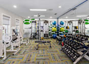 Thumbnail 3 of 29 - 24-hour fitness center with weight equipment - Evergreen Lenox Park