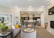 Thumbnail 3 of 30 - The Fairways at Corbin Park clubhouse with seating and breakfast bar