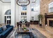Thumbnail 3 of 37 - Resident clubhouse with ample seating - Monterra Las Colinas Apartments