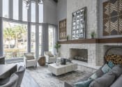 Thumbnail 3 of 23 - The Retreat at Cinco Ranch clubhouse fireplace