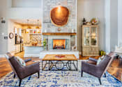 Thumbnail 3 of 23 - Windward Long Point Apartments - Clubhouse interior with fireplace and coffee bar