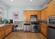Thumbnail 4 of 37 - Antelope Ridge Apartments clubhouse kitchen and coffee bar