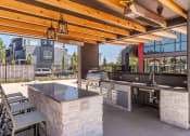 Thumbnail 4 of 21 - Arazo outdoor kitchen and BBQ grill area
