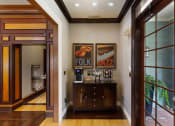 Thumbnail 4 of 24 - Belle Harbour Apartments clubhouse entrance