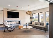 Thumbnail 4 of 46 - Element 25 clubhouse with fireplace and lounge seating