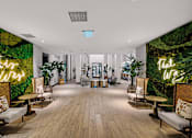 Thumbnail 4 of 36 - Resident clubhouse social area - The Remy Apartments