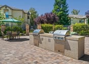 Thumbnail 3 of 30 - Courtyard BBQ and scenic picnic area - Willow Spring Apartments