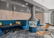 Thumbnail 5 of 32 - Clubhouse fire pit with ample seating - La Via Apartments