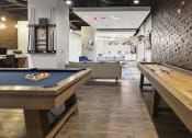 Thumbnail 5 of 24 - The Republic Apartments - Game room in the resident clubhouse
