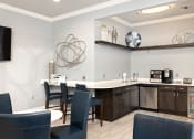Thumbnail 5 of 18 - Weston Point Apartments - Resident clubhouse coffee bar