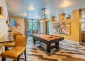 Thumbnail 6 of 26 - Centre Pointe Apartments game area with a billiards table