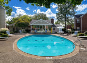 Thumbnail 6 of 18 - East Chase Apartments swimming pool