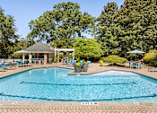 Thumbnail 6 of 29 - Resort-style pool and sundeck - Evergreen Lenox Park