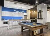 Thumbnail 6 of 24 - The Republic Apartments - Clubhouse amenities including kitchen area and game room