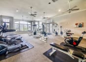 Thumbnail 6 of 24 - Courtney Station Apartments - State-of-the-art fitness center with free weights