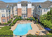 Thumbnail 8 of 29 - Resort-style swimming pool aerial view - Avenel at Montgomery Square
