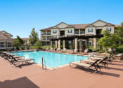 Thumbnail 8 of 22 - Cordillera Ranch Apartments swimming pool with surrounding sundeck