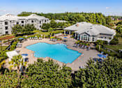 Thumbnail 8 of 22 - Aerial of resort-style swimming pool - Courtney Station Apartments