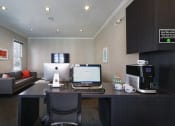 Thumbnail 9 of 24 - Island Park and Harbor Town Square Apartments - Resident business center with coffee station